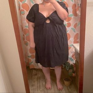 Black summer dress with chest cutout and puffy sleeves